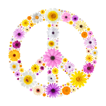 Peace symbol made from many isolated colorful flowers on white background.