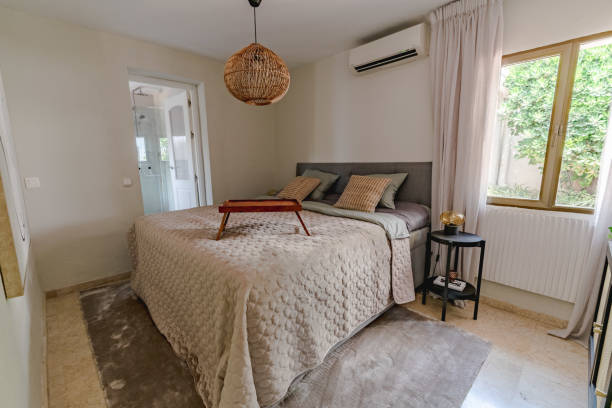 istock Cream styled master bedroom in luxury chalet 1731465315