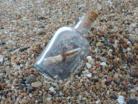 A scroll in a bottle with a message from the past