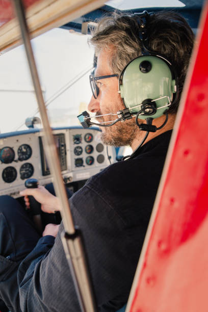 istock Man riding ultralight aircraft 1731475852