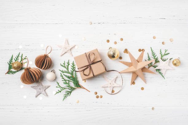 istock Festive Christmas background with gift box and Christmas decorations 1731478029