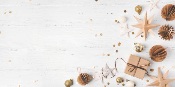 istock Festive Christmas background with gift box and Christmas decorations 1731478034