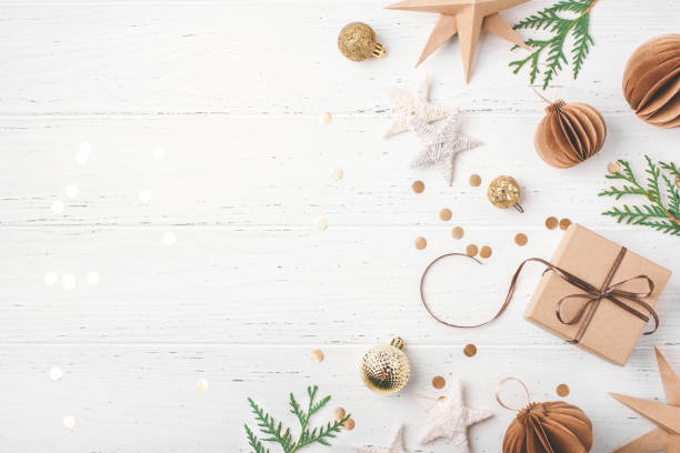 istock Festive Christmas background with gift box and Christmas decorations 1731478036