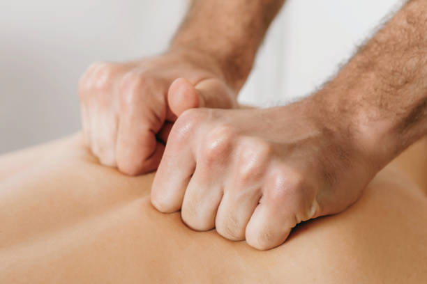istock Top view close up of massage hands massing female back skillfully 1731483699