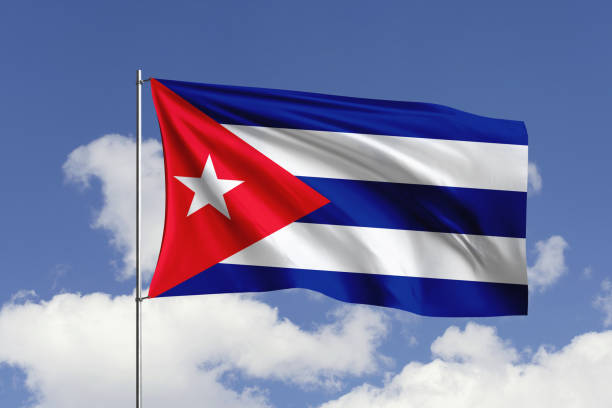 istock Cuba flag fluttering in the wind on sky. 1731490237