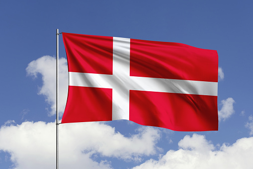3d illustration flag of Denmark. Denmark flag isolated on the blue sky with clipping path.