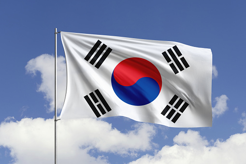 3d illustration flag of South Korea. South Korea flag isolated on the blue sky with clipping path.