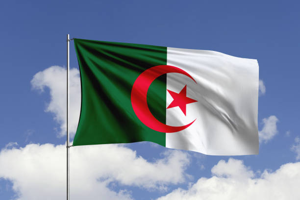 istock Algeria flag fluttering in the wind on sky. 1731506918