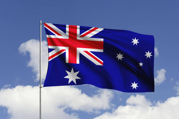 istock Australia flag fluttering in the wind on sky. 1731508635