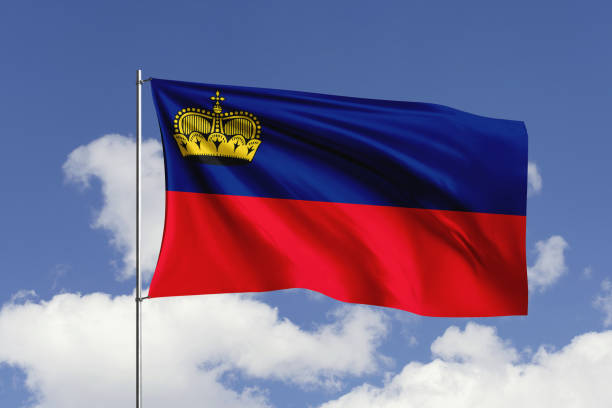 3d illustration flag of Liechtenstein. Liechtenstein flag isolated on the blue sky with clipping path.