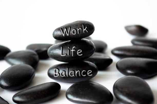 istock Work life balance text engraved on white stones. Life balance concept. 1731520033