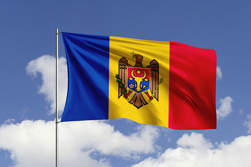 3d illustration flag of Moldova. Moldova flag isolated on the blue sky with clipping path.