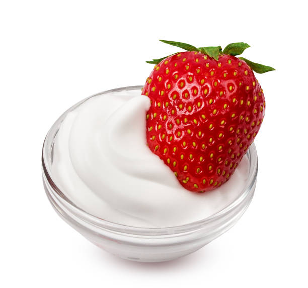 istock Strawberry with whipped cream isolated on white background with clipping path 1731525941