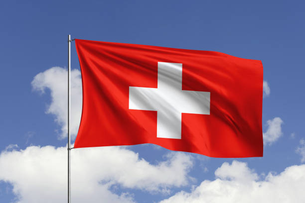 istock Switzerland flag fluttering in the wind on sky. 1731535968