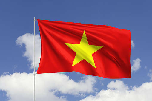 3d illustration flag of Vietnam. Vietnam flag isolated on the blue sky with clipping path.