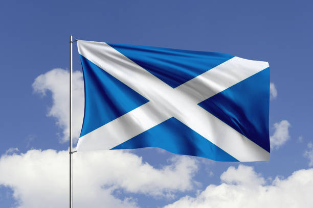 istock Scotland flag fluttering in the wind on sky. 1731543763