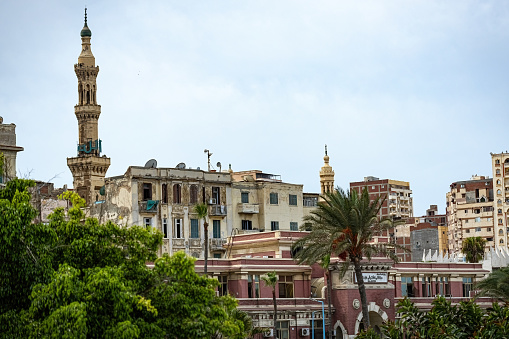 Old Historical houses and mosque minaret in the old town of Alexandria Egypt
