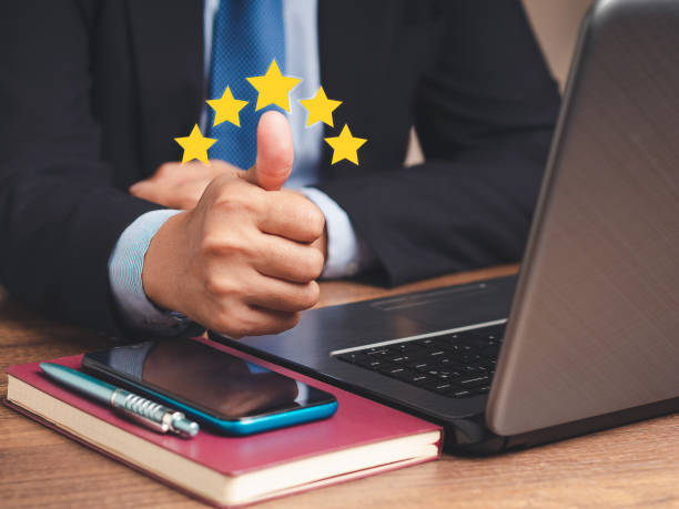 istock Businessman hand with thumb up for best excellent services satisfaction client giving a five-star rating 1731557698