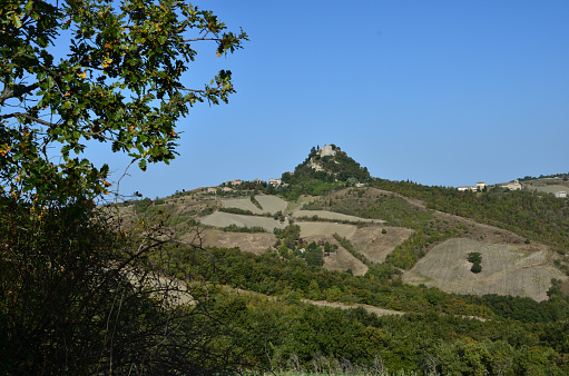 On the hills of the Reggio Emilia Apennines stands the cliff on which the castle of Canossa was built, home of Matilde di Canossa