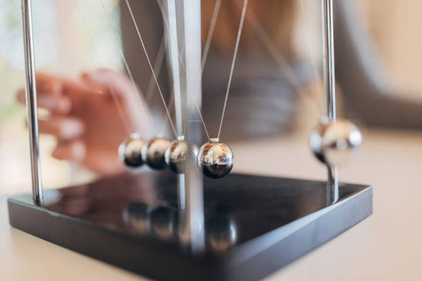 istock Newton's cradle businessman concept for cause and effect 1731576861