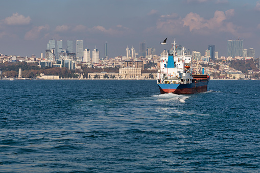 Cargo ship passing Bosphorus Strait, Istanbul, Turkey
