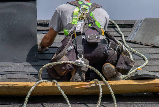istock roofer construction roof maintenance rope security worker 1731578188