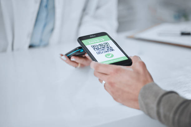 istock Qr code, contactless payment and hands with phone or customer at pharmacy POS to purchase service in store. Technology, smartphone and person buy with card machine online or mobile app for healthcare 1731588070