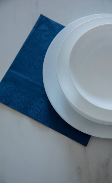 istock An empty white plates, overhead flat lay shot 1731600999