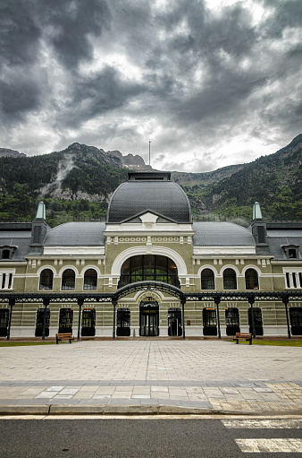 Canfranc Station, Spain, is a historic railway station known for its grandeur and architectural beauty. With its ornate facade and sprawling size, it stands as a symbol of a bygone era of luxury and cross-border travel.