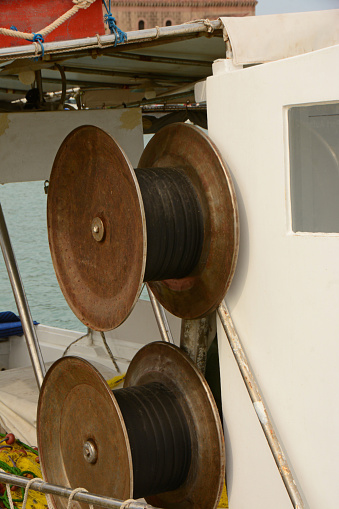 Zakynthos harbour : part of fishing boat with two cable winch.