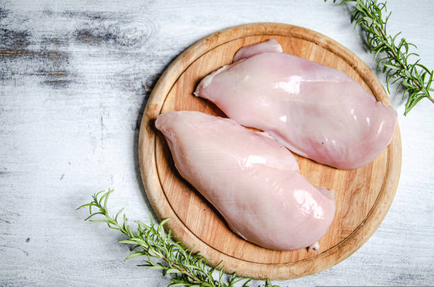 istock Fresh chicken fillet with spices. 1731693558