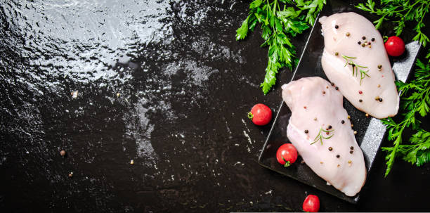 istock Fresh chicken fillet with spices. 1731700912