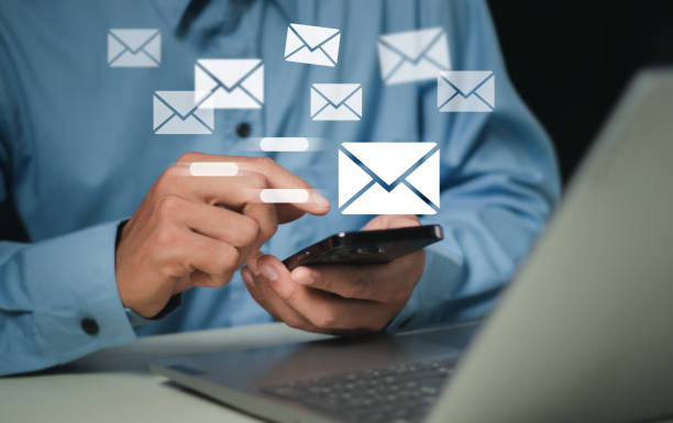 istock Businessman sending email by laptop computer to customer, business contact and communication, email icon, email marketing concept, send e-mail or newsletter, online working internet network. 1731704310