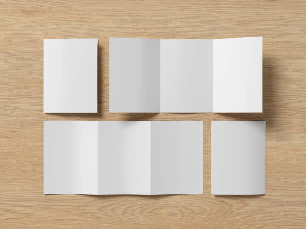 istock Vertical A5 trifold roll brochure booklet mockup on wooden background 1731751390
