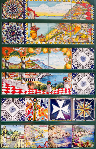 Amalfi , Italy - 3 September 2023. Traditional ceramic souvenirs, multi-colored tiles with a traditional image stock photo