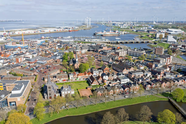 Aerial view Dutch residential area Delfzijl with harbor in the Netherlands stock photo