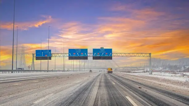 Photo of Driving on the highway A1 near Amsterdam in a snowstorm in the Netherlands