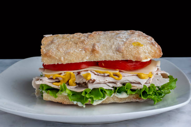 istock turkey with cheese tomato on a ciabatta 1731809071