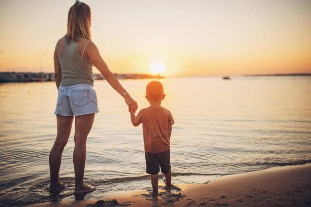 istock Woman with son by the sea 1731810042