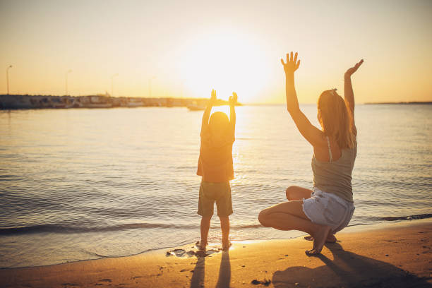 istock Woman with son by the sea 1731815686
