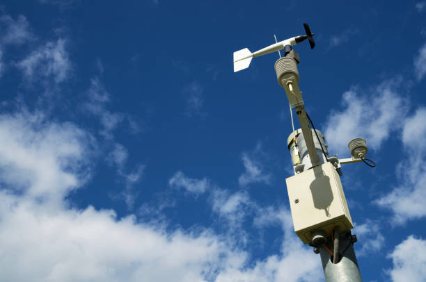 istock White weather station against a blue sky 1731862913