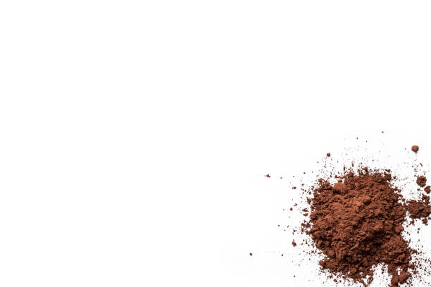 istock Organic dark chocolate powder isolated on a white background from above, top view 1731891671