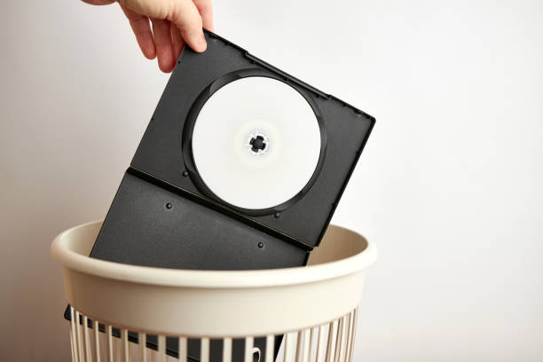 istock The CD in the plastic box is thrown away for recycling and disposal 1731901447
