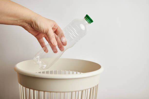 istock An empty plastic bottle is thrown away in a landfill for disposal and recycling 1731902509