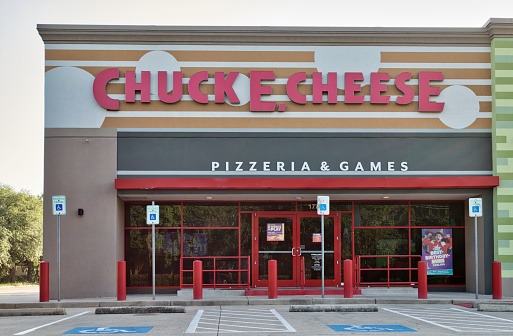Houston, Texas USA 07-30-2023: Chuck E. Cheese location in Houston, TX. American restaurant and entertainment center chain store popular for children's birthday parties.