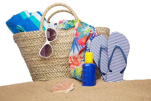 Beach bag and accessories Sand and beach gear isolated on white. beach bag stock pictures, royalty-free photos & images