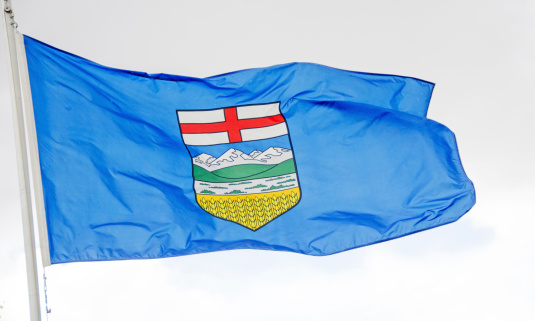 Alberta flag flying.