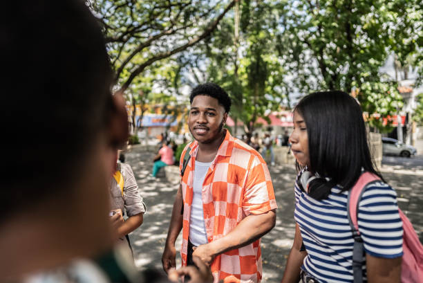 istock University students talking with their friends outdoors 1731933886