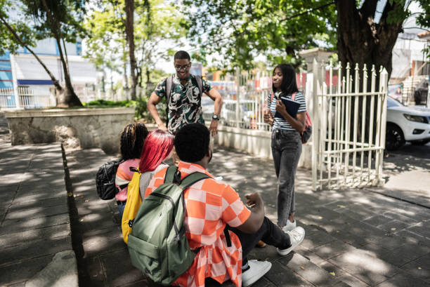 istock University students talking at university campus outdoors 1731934798