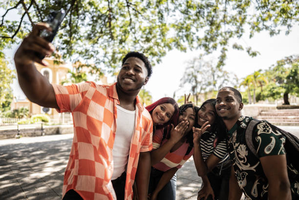 istock University students taking a selfie using mobile phone outdoors 1731935041